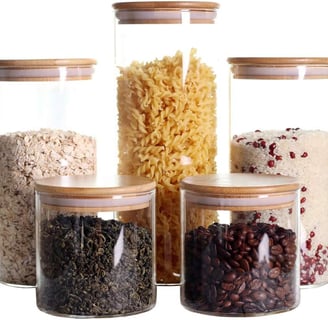 a variety of food items in a glass jar