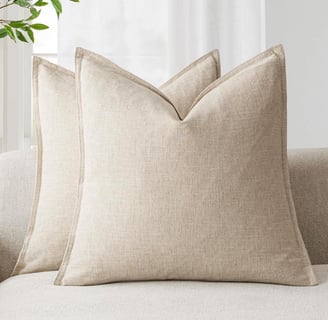a couch with pillows and pillows on it