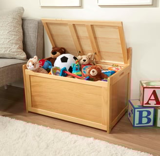 a toy chest with a toy and a toy box