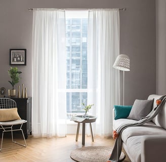 a living room with a couch and a chair