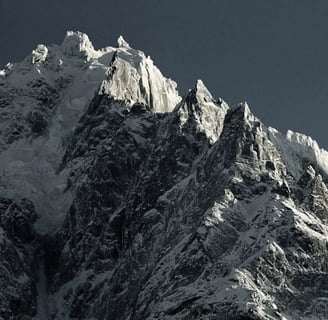 a mountain with a moon in the sky symbolizing leaders and potential to reach