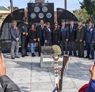 Tracy veterans and civic leaders in front of the Tracy War Memorial on Memorial Day