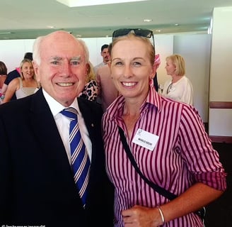 Michelle Goszko with the Australian Prime Minister John Howard