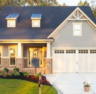 a house with a driveway and driveway with a driveway