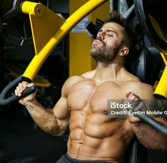 a man doing a chest press machine