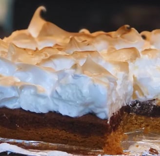 the ultimate smores bar dessert with smokey marshmallow meringue