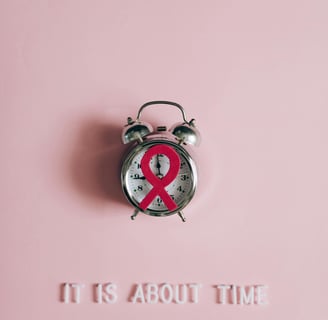 a clock with a ribbon around it and a ribbon around it. breast cancer awareness