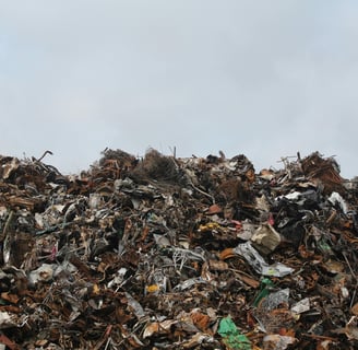 a pile of metal pipes and other metal objects