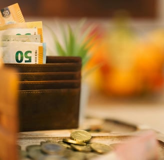 a wallet with money and coins in it