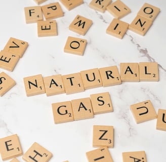 a bunch of scrabbles that say natural gas