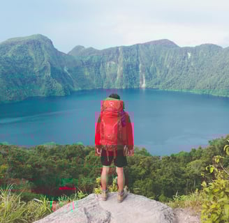 a man with a red backpack '