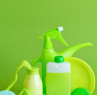 a variety of cleaning products including a bottle of cleaner
