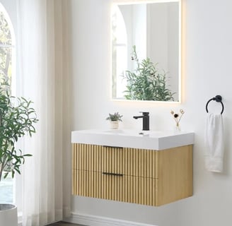 Regal Touch Home showcases a space-saving wall-mounted vanity with clean lines and storage drawers.