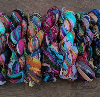 Recycled Patterned Chiffon 1" wide ribbon. 100g skein has a length of 70+ meters.