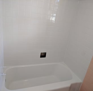 a tub and tile shower refinished in white in tyler texas