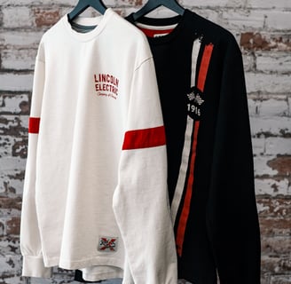 two shirts hanging on a clothes rack in a studio, Product photography, Amazon Photoshoot, Ecommerce 
