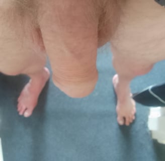 Axel TheBeast standing showing his penis