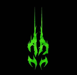 a green dragon head with flames on it