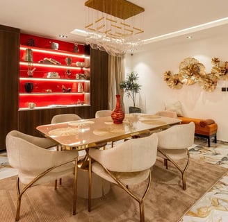 a dining room with a table and chairs