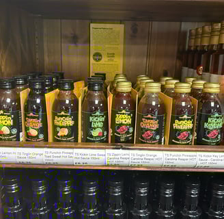 Toad Sweat bottles on shelf in wooden cabinet