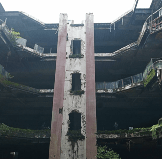 Inside of the New World mall, with the abandoned elevator