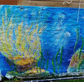 détail d'une peinture murale représentant untrésor échoué au fond de l'océan