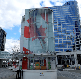 Canada Place Welcome Centre - a building with a large canadian flag on it