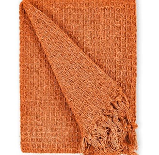 Orange autumn knit throw with fringes