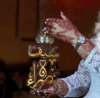 a woman in a white dress holding a small clock