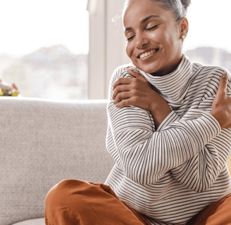 Happy and Satisfied Patient Practicing Self Compassion GLEO Wellness Medical Weight Loss Service in Massachusetts
