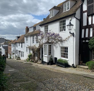 photograph of beautiful street in a small village in england