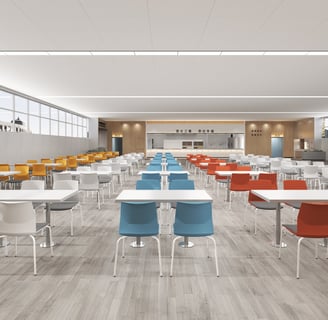 Large cafeteria setup with multicolored Rita chairs arranged in rows