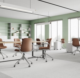 Office lounge with SenSit-Otto swivel chairs and bookshelf wall