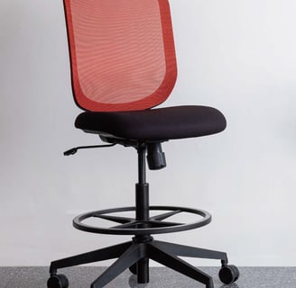 Red mesh Sensit T127 drafting stool with black seat and footring, front view