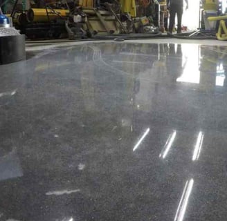 Traitement béton, ponçage et résines décoratives - solutions DG Services pour sols industriels & des
