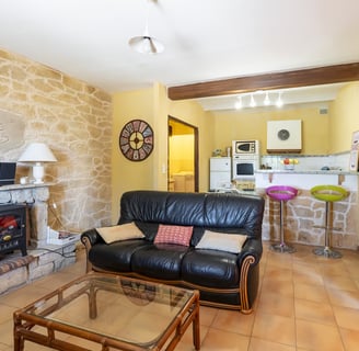 a living room with a couch and a table