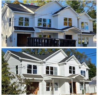 Front view of a house featuring modern standing seam metal roofing and gutter upgrades