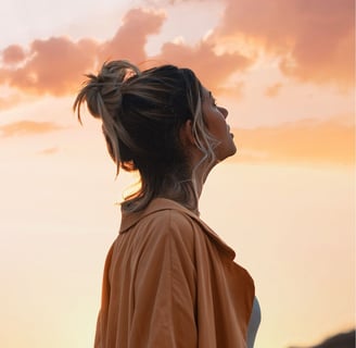 a woman looking at the sky