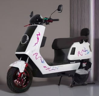 a scooter with graffiti on it