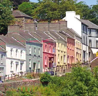 The colourful houses on Llandeilo main street as it climbs the hill