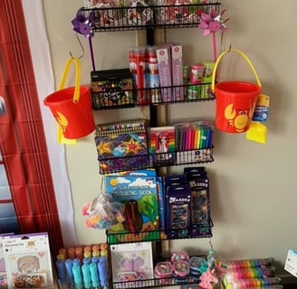 a shelf with a bunch of toys