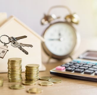 A homebuyer reviewing a budget before purchasing