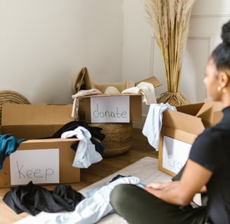 young lady decluttering her home 