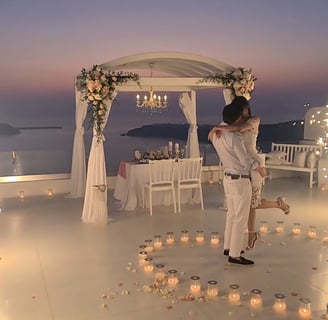 Memorable Santorini proposal marked by elegant stage fireworks under the stars.