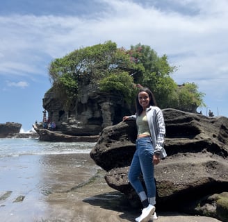 Tanah Lot temple, perched on a rock formation surrounded by the ocean