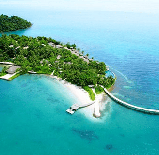 a small island with a small island in the middle of the ocean