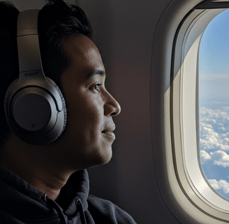 Noise cancelling headphones on a long airplane flight