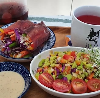 Summer rolls, chopped salad, and frozen berries beverage