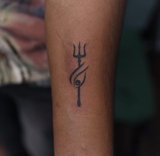 Spiritual Trishul and Third eye tattoo design by Dudo’s Tattoos and Piercing Hyderabad
