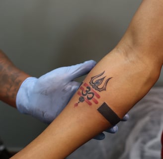 Spiritual Trishul and Om tattoo design by Dudo’s Tattoos and Piercing in Hyderabad